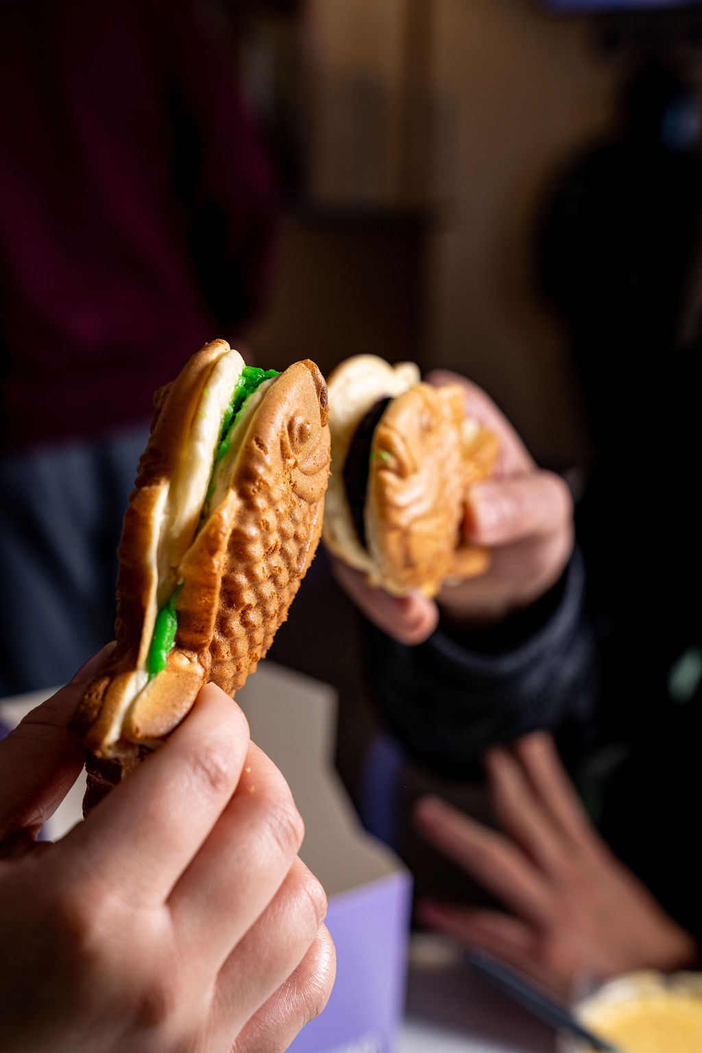 Two Rice Culture guests sharing a taiyaki toast
