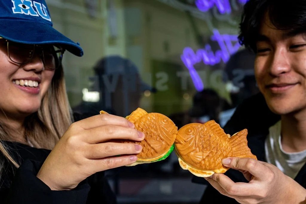 Two Rice Culture guests sharing a taiyaki